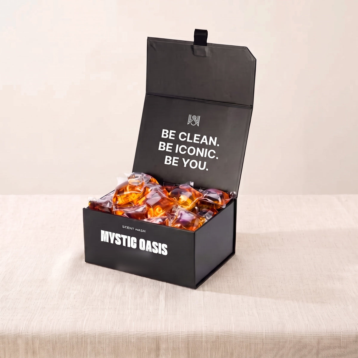 Mystic Oasis laundry pods box, open, on linen